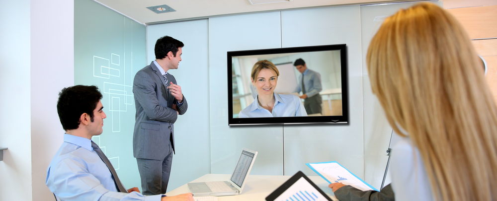 Business people attending videoconference meeting-1